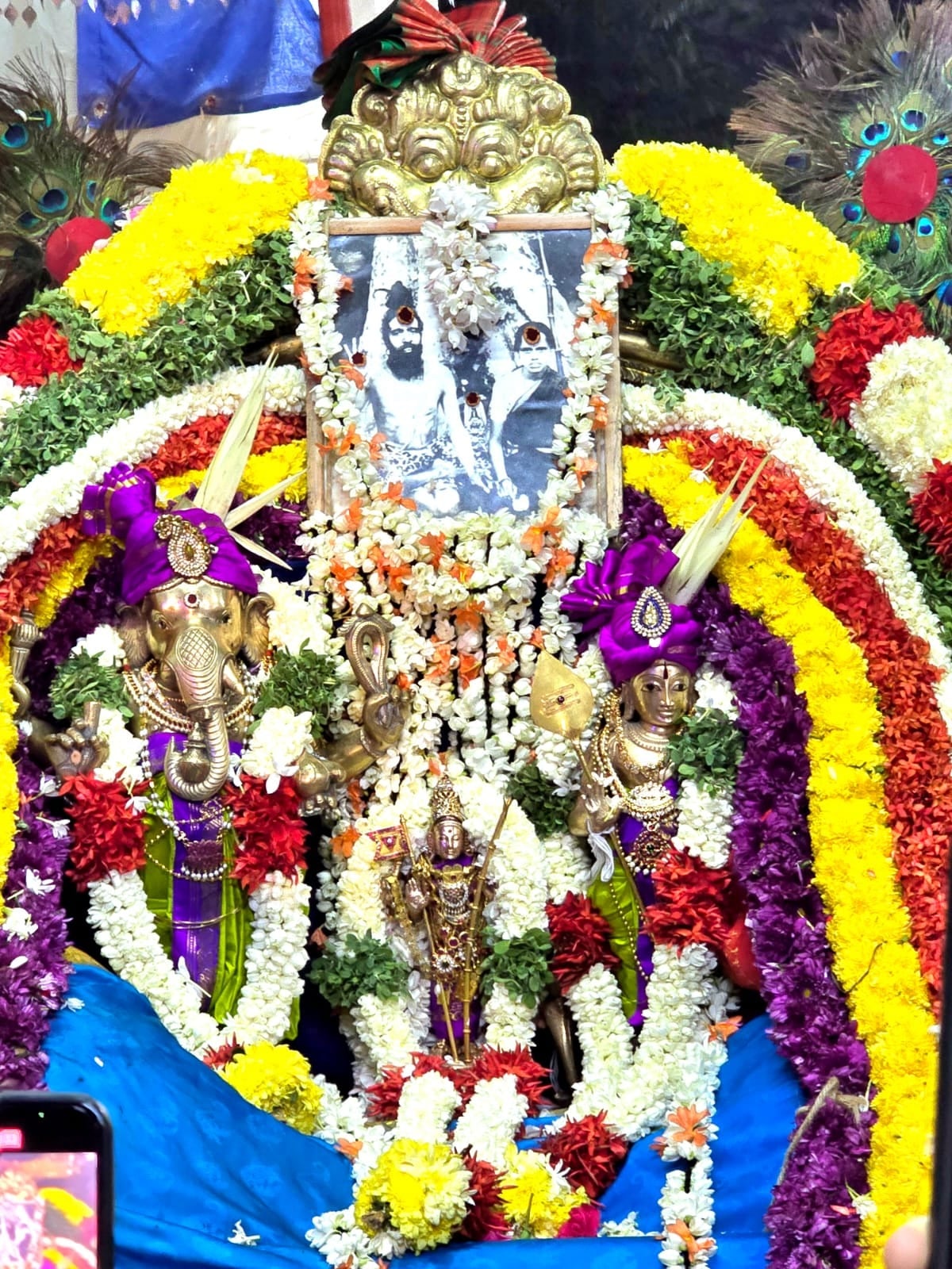 Flower-adorned sannidhis at Sivasakthi Ashram